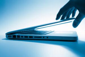 hand-opening-laptop