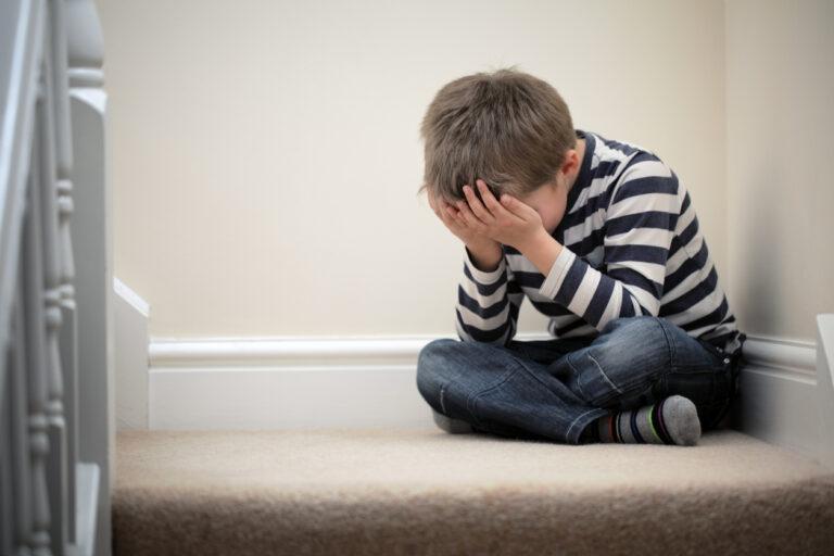 child-crying-on-staircase