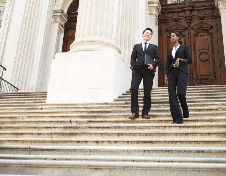 lawyers-walking-down-courthouse-steps