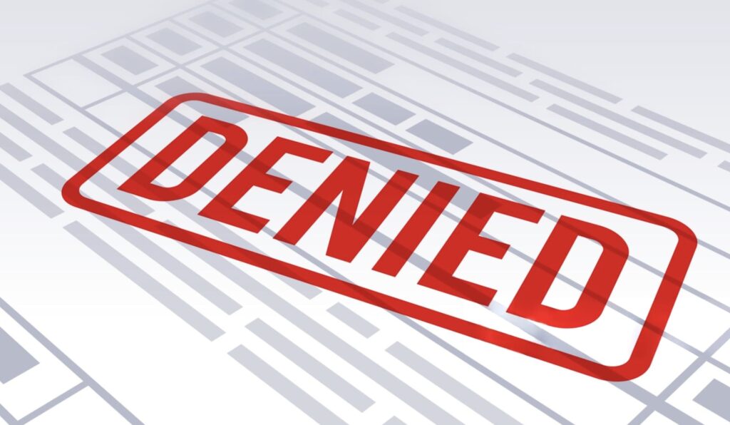 A legal document with the words "Non-Disclosure Order" stamped "DENIED".